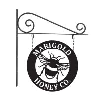 Close-Up of Circular Steel Bumble Bee Hanging House Name Sign Close-Up of Circular Steel Bumble Bee Hanging House Name Sign