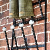 Close up of ceramic ends on boot rack 