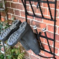 Close up of 6 pair boot rack 