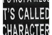 Humorous Interior Iron House Sign in Black Close-Up Humorous Interior Iron House Sign in Black Close-Up