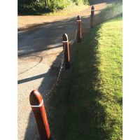 Black Galvanised Steel Chain in Use in a Garden Black Galvanised Steel Chain in Use in a Garden