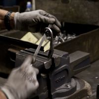 Curly Tail Lever on Square Rose Black Iron Curly Tail Lever on Square Rose Black Iron