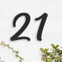 Black Individual House Numbers - Hestina Font on white wall