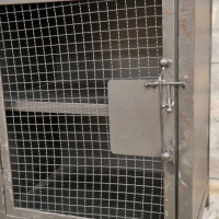 Close-up of the Clasp and Cage Design on the Industrial "Cage" Cabinet