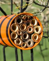 Close up of insect hotel detail on recycled metal sculpture