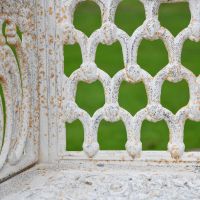 Close up of Cast Iron Garden Bench Details with Antique Cream Finish Close up of Cast Iron Garden Bench Details with Antique Cream Finish