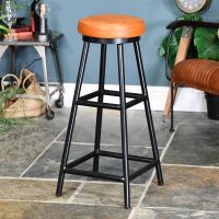 Iron & Brown Goat Leather Backless Bar Stool in the Living Room