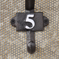 Close-up of the White Painted Number 5 Close-up of the White Painted Number 5