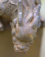 Close-up of Cast Iron Curious Dragon Sculpture