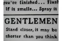 "Toilet Rules" Iron Sign in White Close-Up