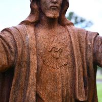 Close up of Cast Iron "Christ the Redeemer" Statue with Heart Motif