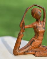 Close up Detail of Rustic Yoga Poser Sculpture