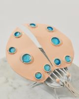 Close up of wing detail on scrap metal art sculpture Close up of wing detail on scrap metal art sculpture