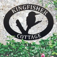 Kingfisher Iron Oval House Sign in situ in a Stone Wall