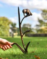 Scale image of kingfisher on reed