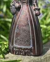 Close up of clothes detail on rabbit garden sculpture