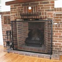 Black Fire Screen in front of fire