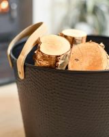 Close-Up of Large Black Contemporary Dotted Log Basket 
