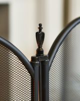 Close Up Of Large Black Four Fold Fire Guard Panels Close Up Of Large Black Four Fold Fire Guard Panels