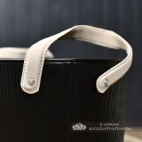 Close-up of the Suede Carry Handles Close-up of the Suede Carry Handles