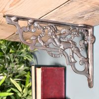 Ornate Cherub Shelf Bracket Created From Iron