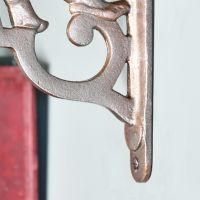 Close-up ofthe Ornate Design on the Bottom of the Bracket