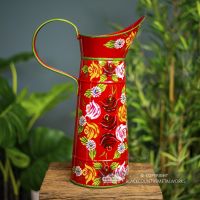 Side view of the Red Hand Painted Jug Side view of the Red Hand Painted Jug