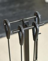 Close-Up of Parallel Bars on Black Companion Set