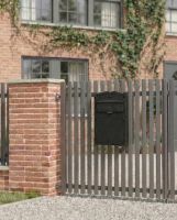 lb1010_-_mulrose_postal_box installed on a gate on a new home