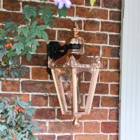 Copper Hexagonal Wall Lantern on Wall 
