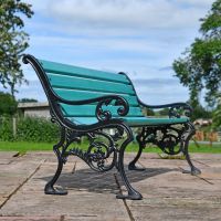 Side view of Ornate Green Cast Iron Garden Bench