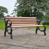 Ornate Design Brown Park Bench in Situ on the Patio