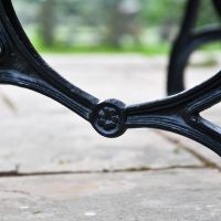 Close-up of the Cast Iron Legs on the Ornate Design Brown Park Bench