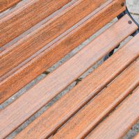 Close up of brown slats on garden bench 