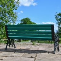 Rear view of Green Victorian Park Bench