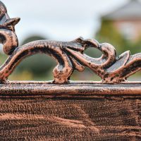 Close up of antique bronze filigree design  Close up of antique bronze filigree design