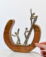 Scale image of cast aluminium and mango wood interior ornament