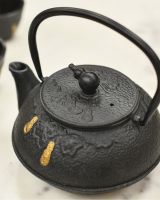 Gold and Black Teapot Lid On 