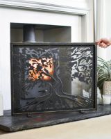 Scale Shot Of "Lignum Vitae" Brushed Gold Fire Guard Scale Shot Of "Lignum Vitae" Brushed Gold Fire Guard