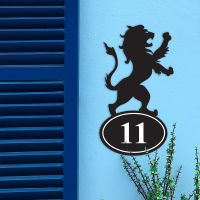 Lion Iron House Number Sign in Situ on a Blue Wall