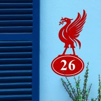 Liver Bird Iron House Number Sign in Situ on a Blue Wall Liver Bird Iron House Number Sign in Situ on a Blue Wall