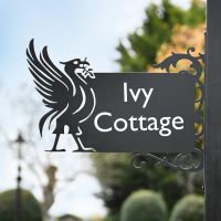 Black Liver Bird Wall Bracketed House Name Sign in Situ