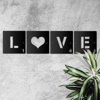 "LOVE" Scrabble Square Letters in Situ Next to Plants "LOVE" Scrabble Square Letters in Situ Next to Plants