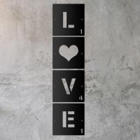 "LOVE" Scrabble Square Letters on a Rustic Grey Wall "LOVE" Scrabble Square Letters on a Rustic Grey Wall