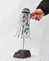 Scale image of scrap metal art sculpture