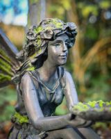 Lyra the generous resin fairy garden sculpture close up headshot