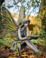 Lyra the generous resin fairy garden sculpture close up