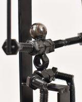 Close up of intricate person detailing on scrap metal art sculpture