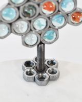 Close up of Scrap Materials Christmas Tree Sculpture base