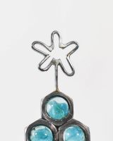 Close up of Scrap Materials Christmas Tree Sculpture star